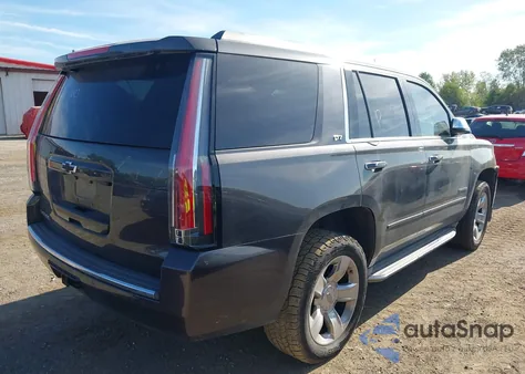 2015 Chevrolet Tahoe Ltz из США, поврежденный, VIN 1GNSKCKC7FR110423